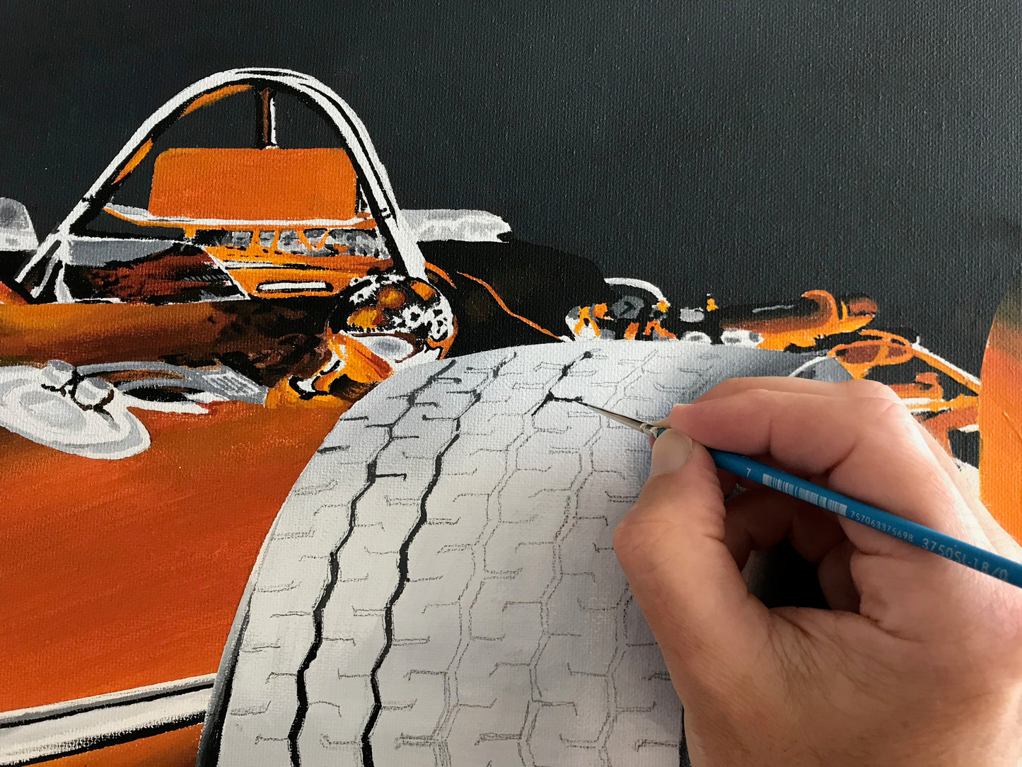 Work in progress: laying down paint on the very detailed tires with the smallest paintbrush I could find.